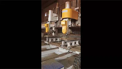Centre d’usinage CNC 5 axes à 2 têtes et 2 canaux d’usinage  